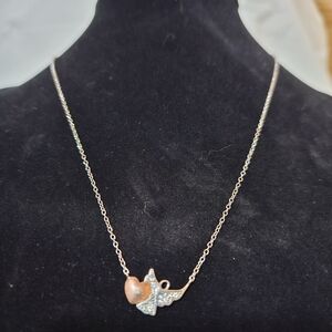 Elegant Gold and Silver Heart Necklace